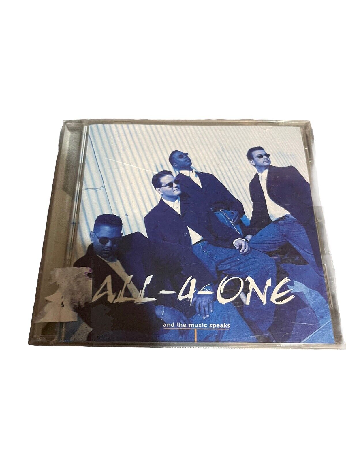 All-4-One And the Music Speaks CD album cover featuring group photo of four men in suits