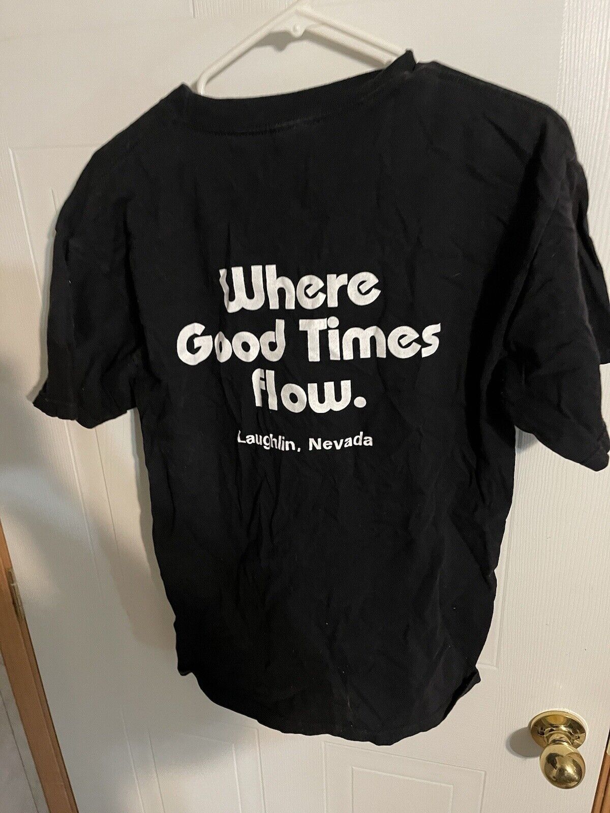 Black Aquarius Casino t shirt with white text reading Where Good Times Flow Laughlin Nevada