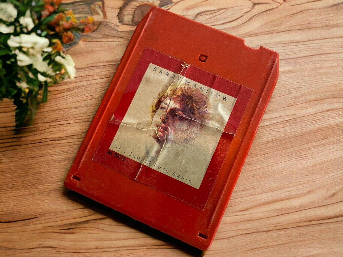 Barry Manilow If I Should Love Again 8 track cartridge with worn label on wooden surface