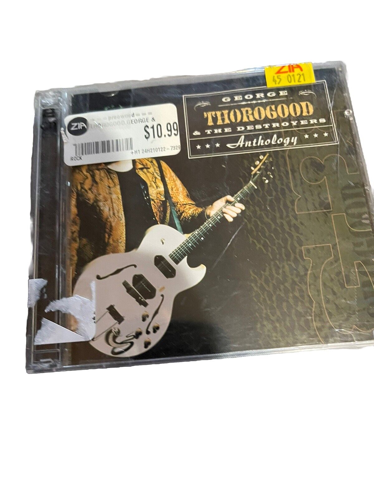 George Thorogood anthology CD featuring The Destroyers with a guitar on the cover priced at 1099