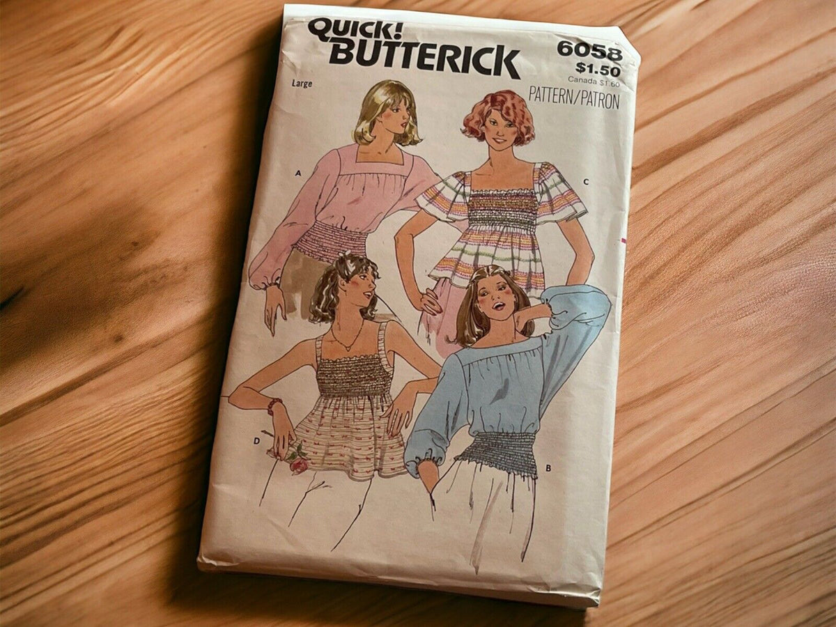 Vintage Butterick sewing pattern featuring four different women's tops designs on packaging