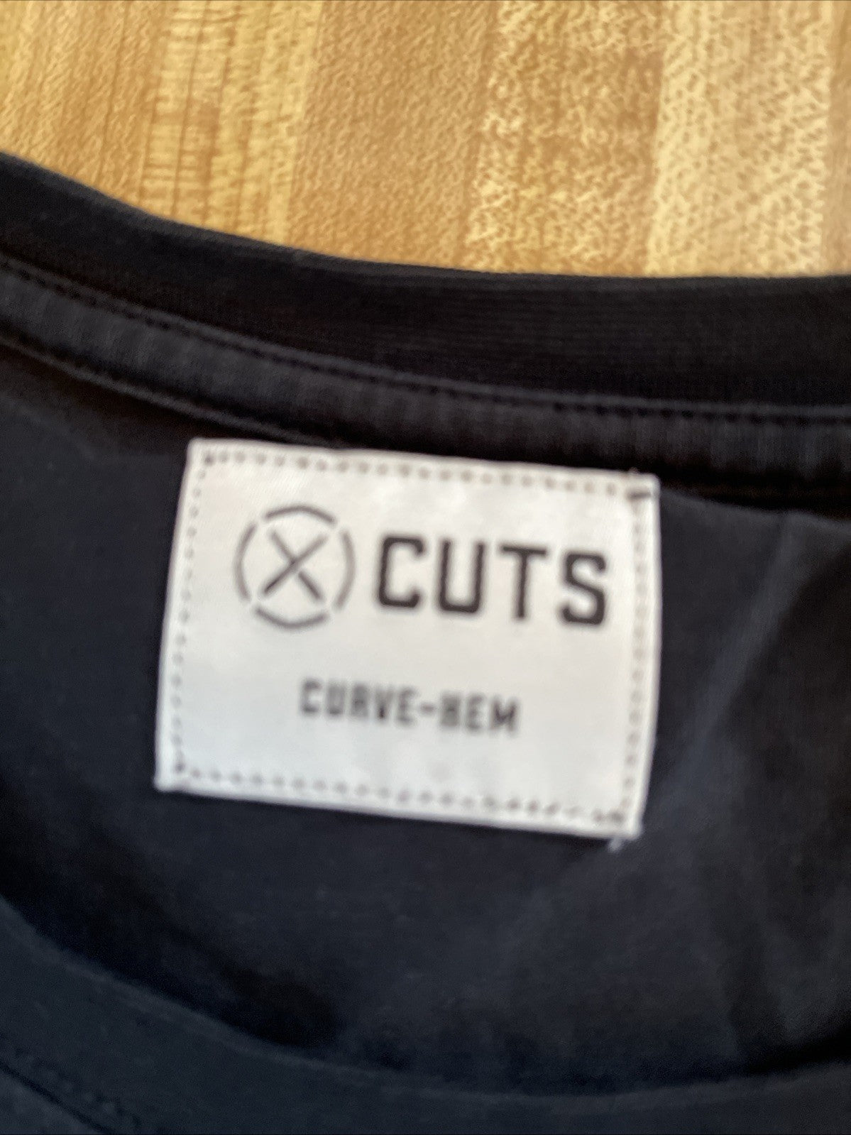cuts curve hem shirt long sleeve Medium