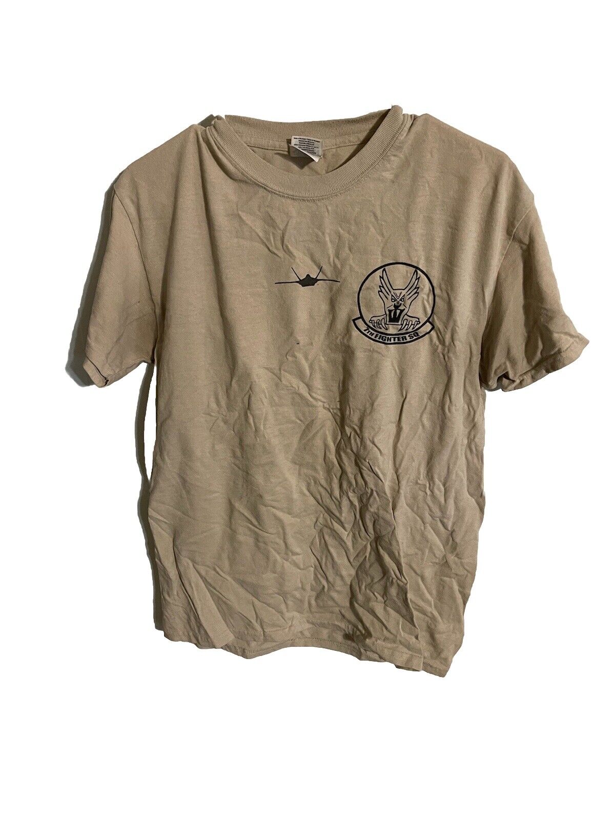 7th Fighter Squadron t shirt in tan with squadron logo and fighter jet graphic on chest