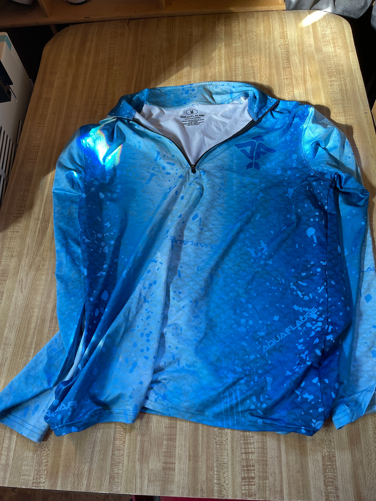 Aquaflauge quarter zip medium
