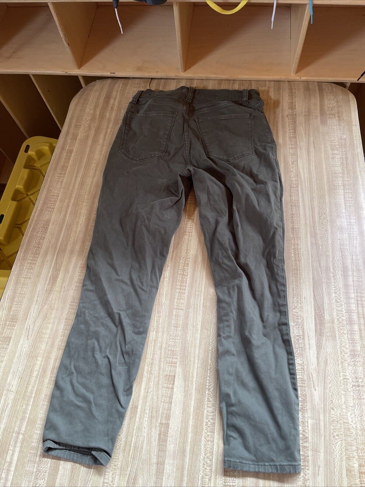 Abercrombie Fitch jeans size 26 in dark gray laid flat showing back pockets and slim fit design
