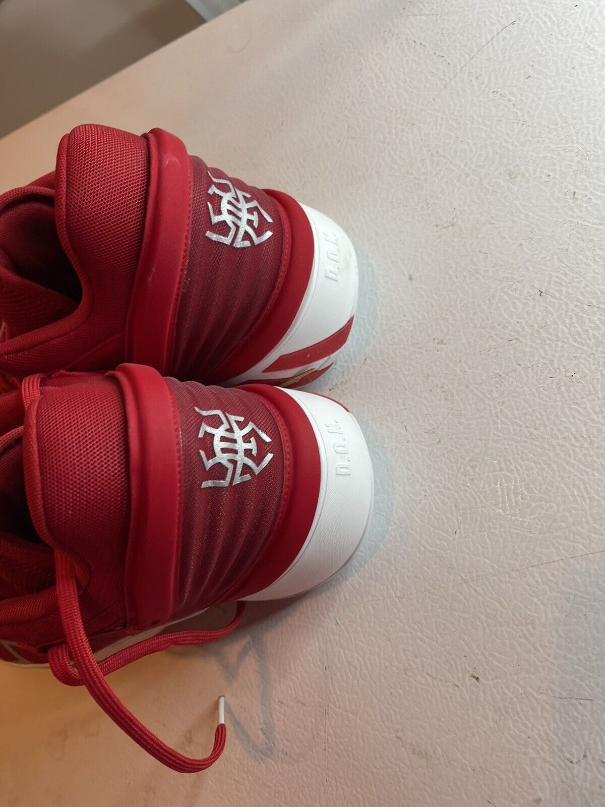 Red adidas D.O.N. Issue 2 size 13 basketball shoes with white soles and detailed heel logos