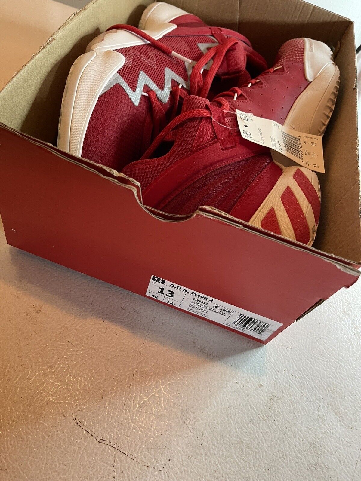 adidas D.O.N. Issue 2 size 13 basketball shoes in red and white inside an open box from 1118 Emporium