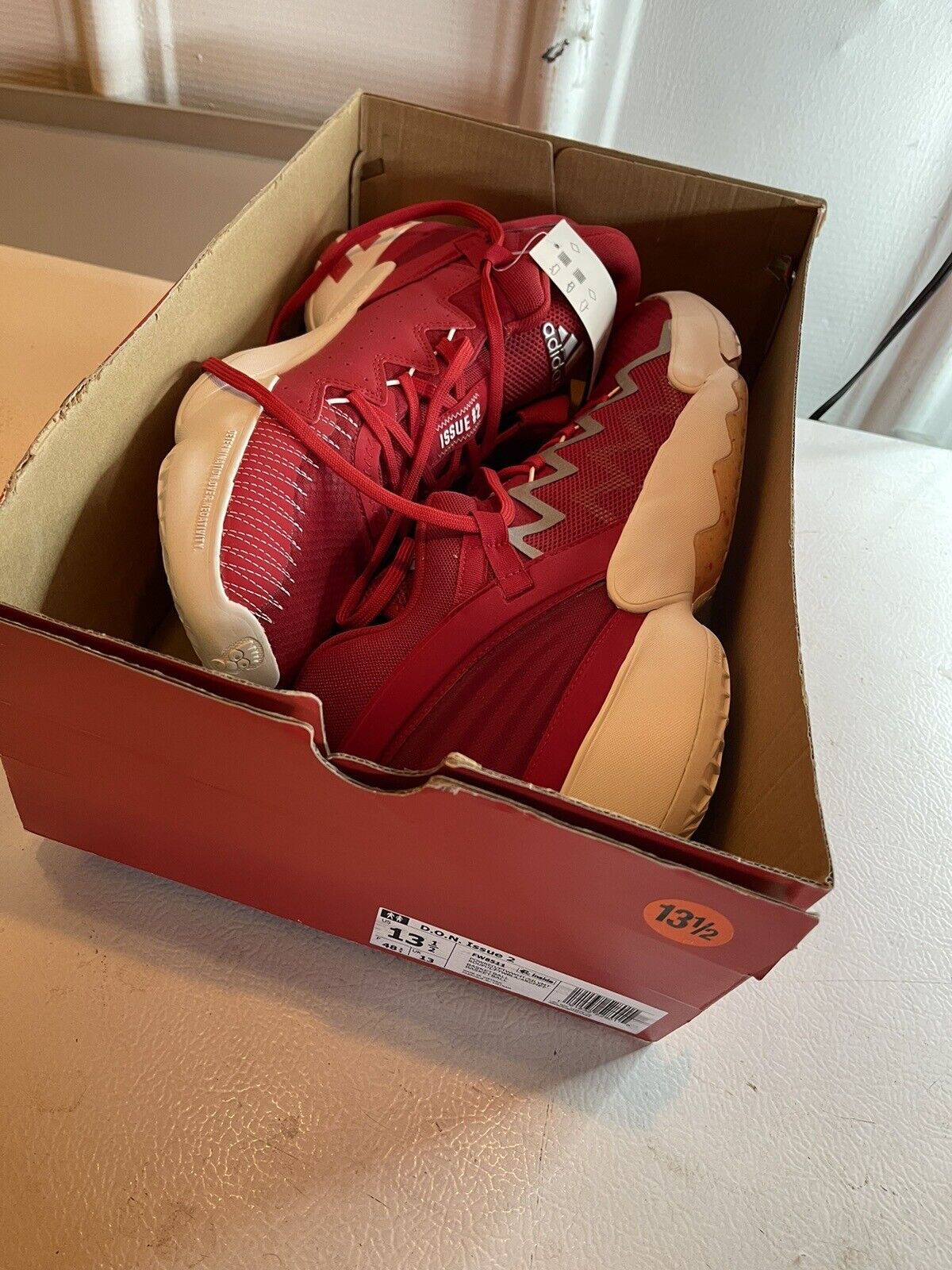 adidas d.o.n. issue 2 size 13.5 red basketball shoes in an open box from 1118 Emporium