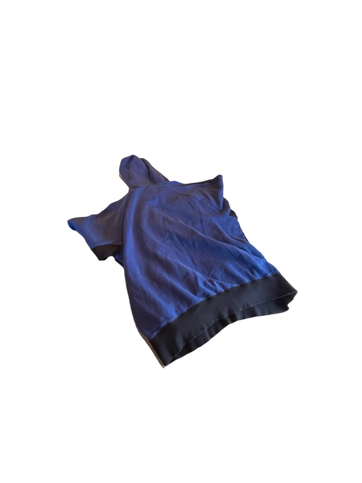 Blue Adidas hoodie large with short sleeves and black hem folded on white background