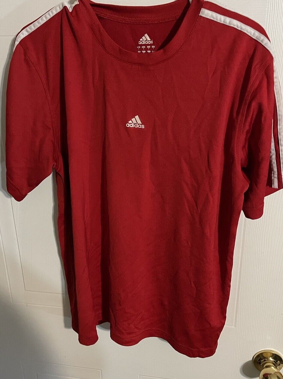 Adidas red t shirt small with white stripes on shoulder and Adidas logo on chest