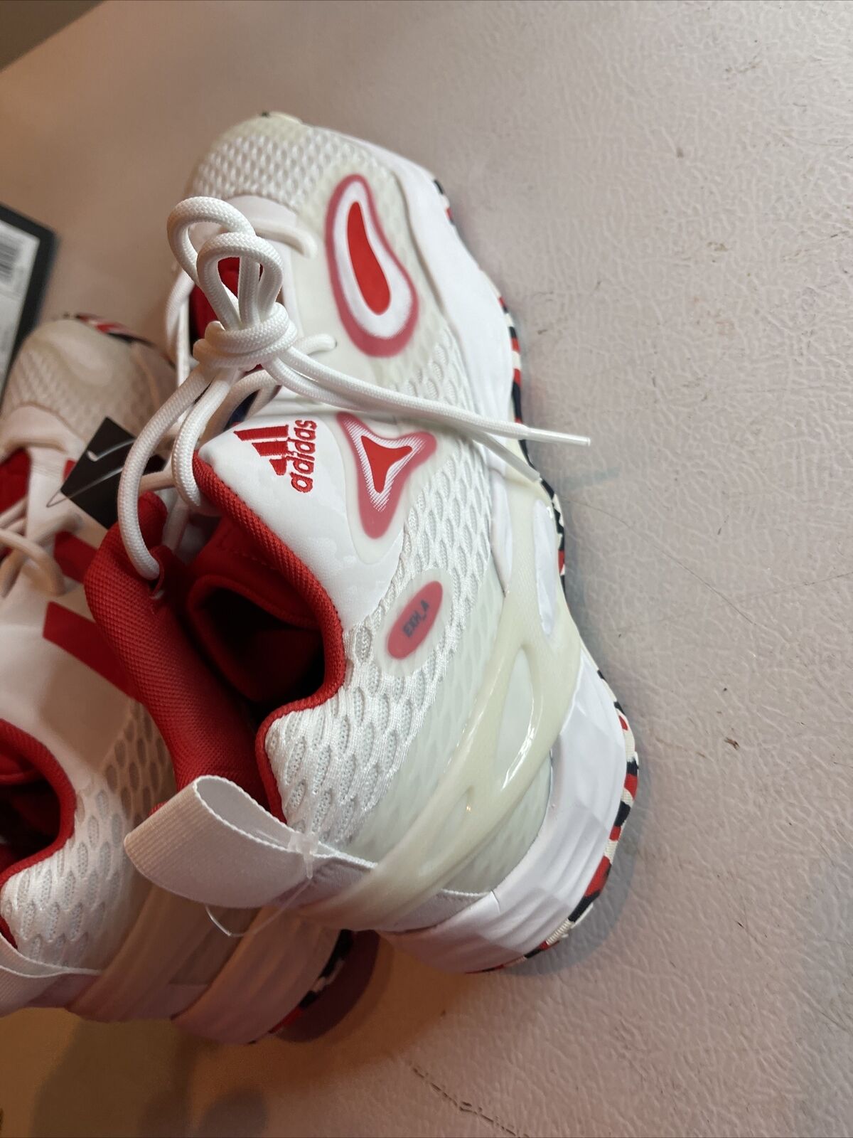 Adidas SM Exhibit A Team USA sneakers in white and red with mesh upper and cushioned sole