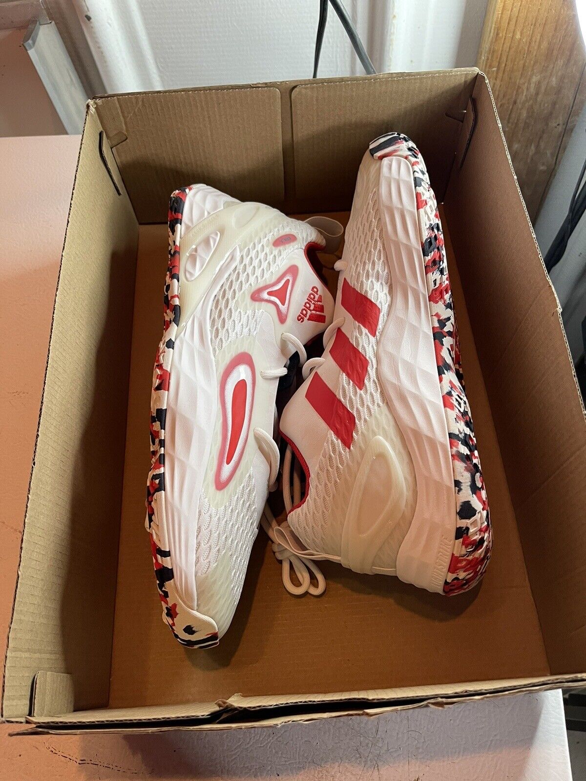 Adidas Team USA sneakers size 12 white with red accents and patterned soles inside a cardboard box