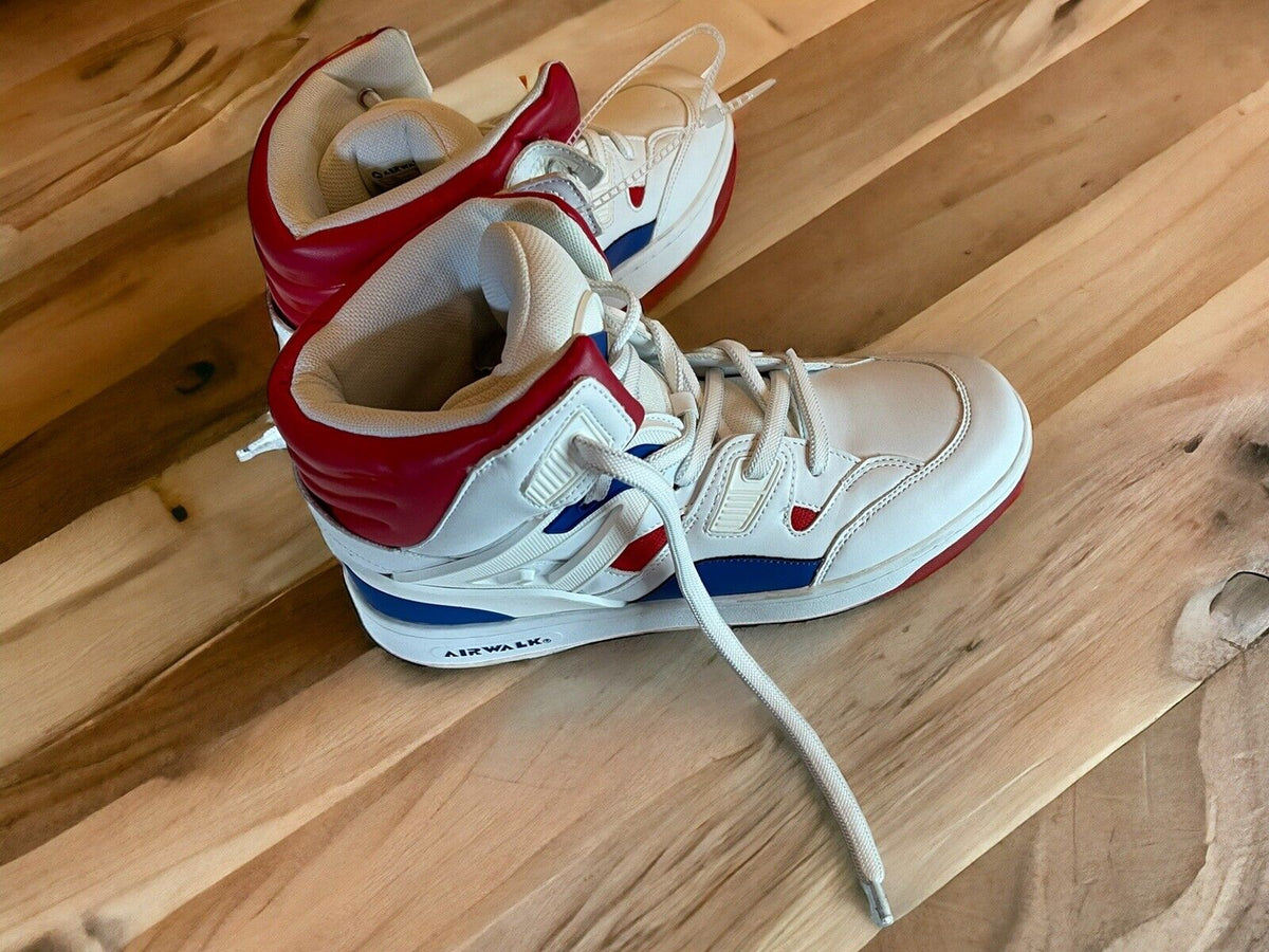 Airwalk men’s sneakers size 9.5 in white with red and blue accents on wooden floor