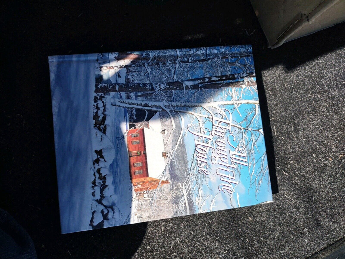 All Through The House book with winter scene cover showing snow-covered trees and a red barn