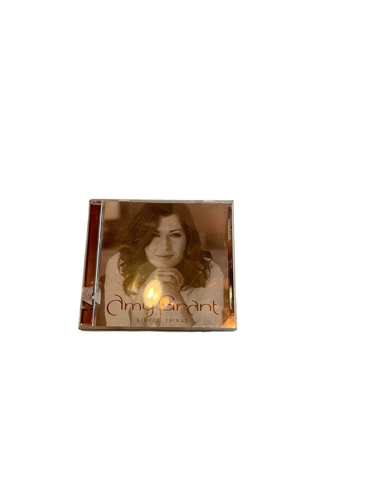 Amy Grant Simple Things rare CD featuring Amy Grant on the album cover with a sepia tone background