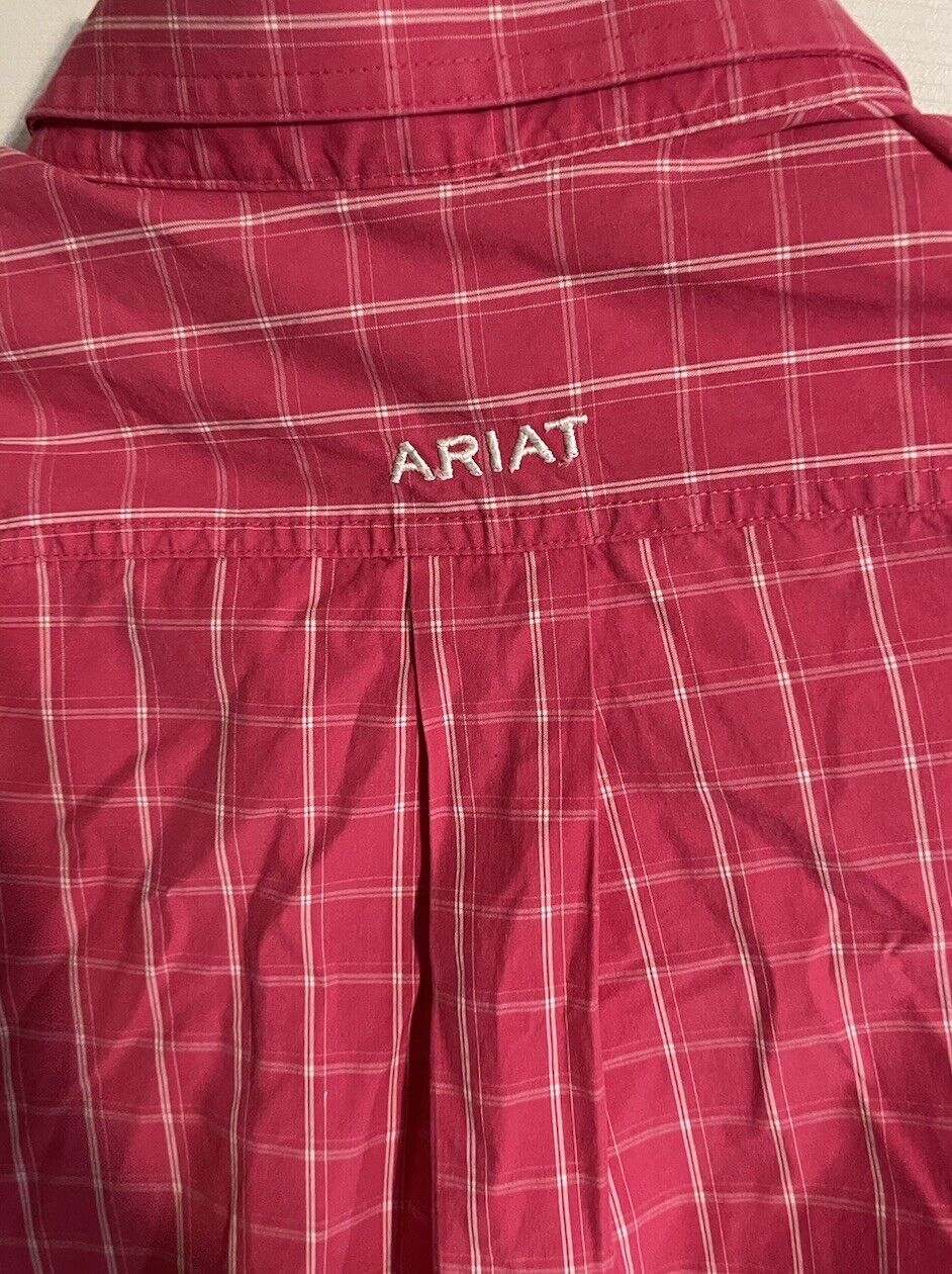 Red plaid Ariat Pro Series shirt with embroidered logo on back yoke and pleated details