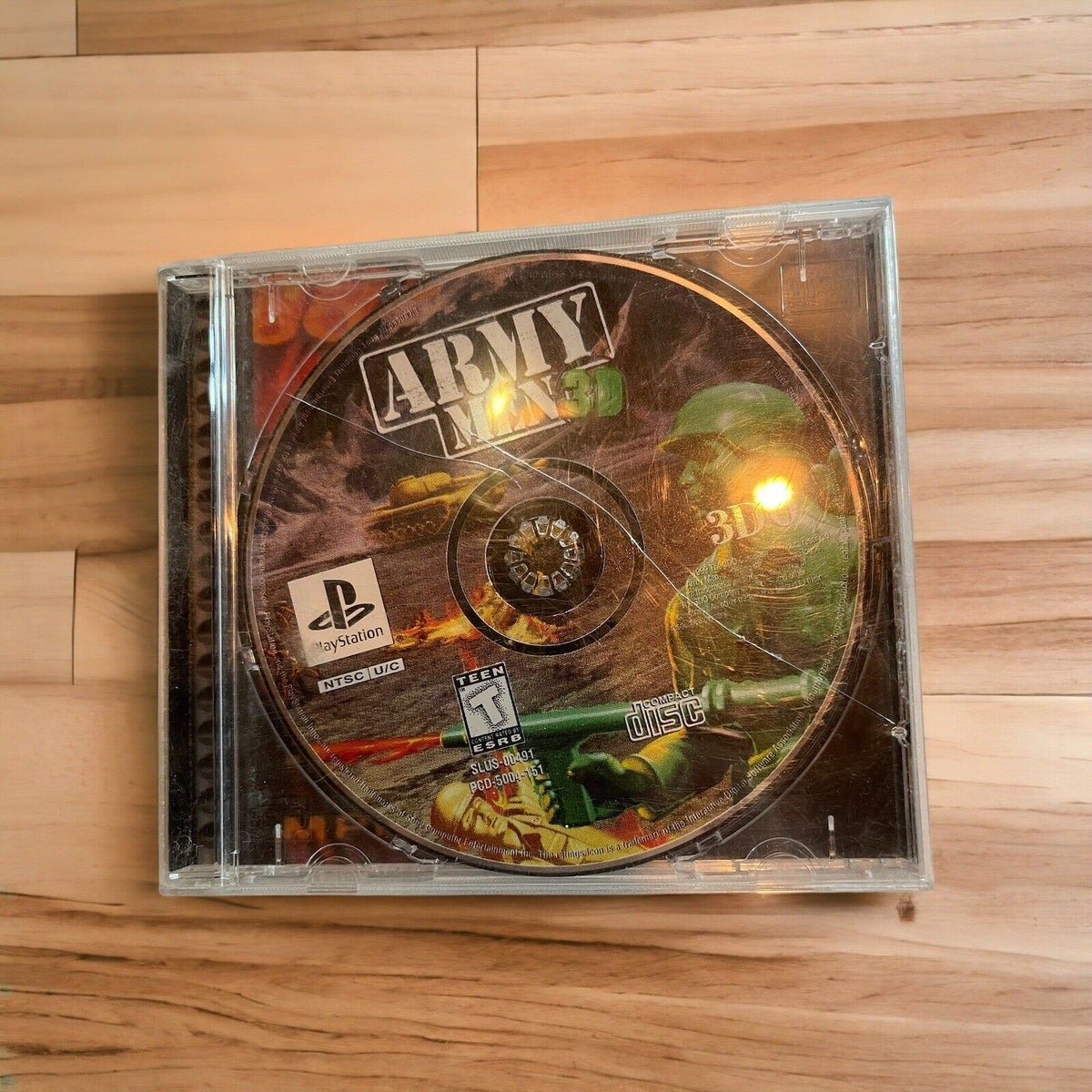 Army Men 3D PlayStation 1 game disc in clear plastic case with soldier artwork on the disc