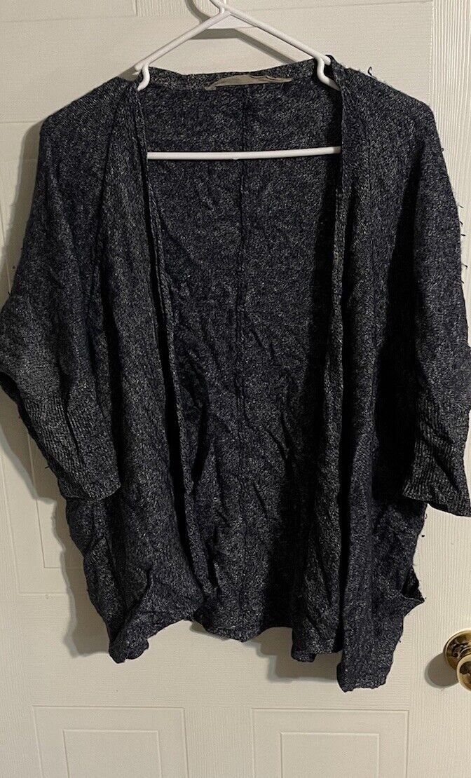Athleta cardigan for women in dark gray knit fabric hanging on white hanger