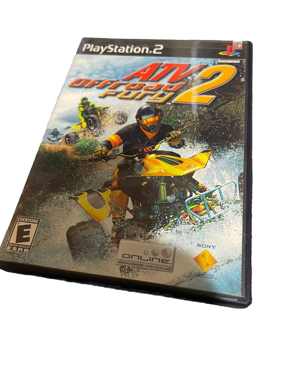 ATV Offroad Fury 2 PS2 game case featuring quad riders in action on muddy terrain