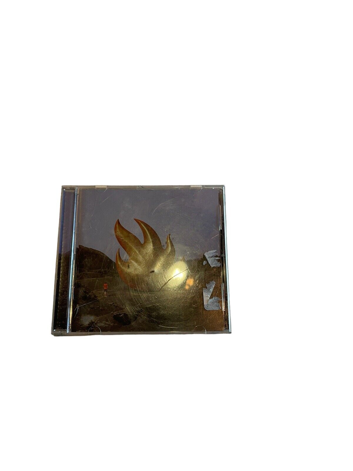 Audioslave CD for sale with dark album cover featuring a flame logo in a plastic jewel case