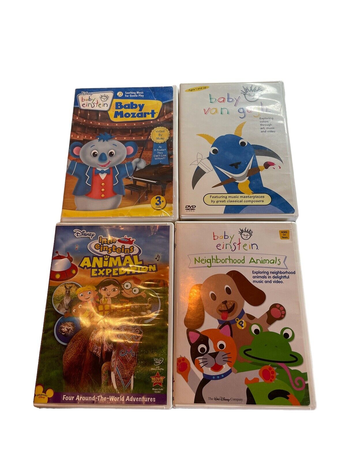 Children's learning video lot featuring Baby Mozart, Baby Von Gogh, Disney Einstein Animal Expedition, and Baby Einstein Neighborhood Animals DVDs