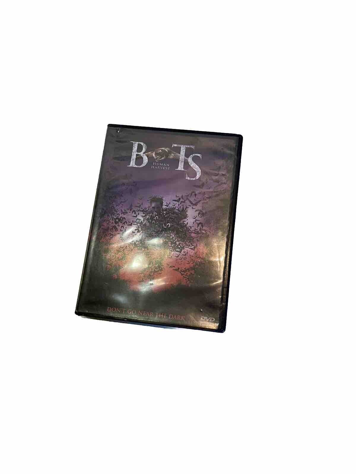 Bats Human Harvest DVD displaying dark cover art with bats flying over a shadowy figure