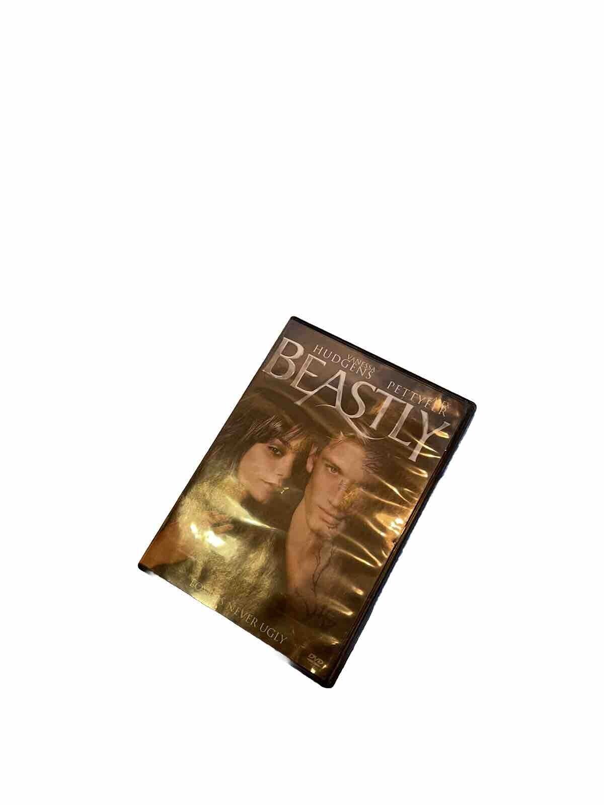Beastly 2011 DVD cover featuring main characters with dark background and title text