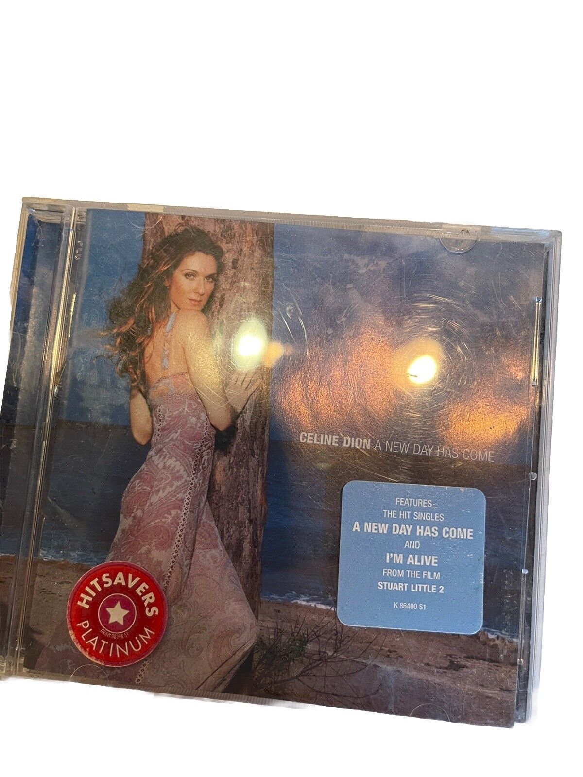 Celine Dion A New Day Has Come album 2002 CD case with cover photo of the artist in a pink dress