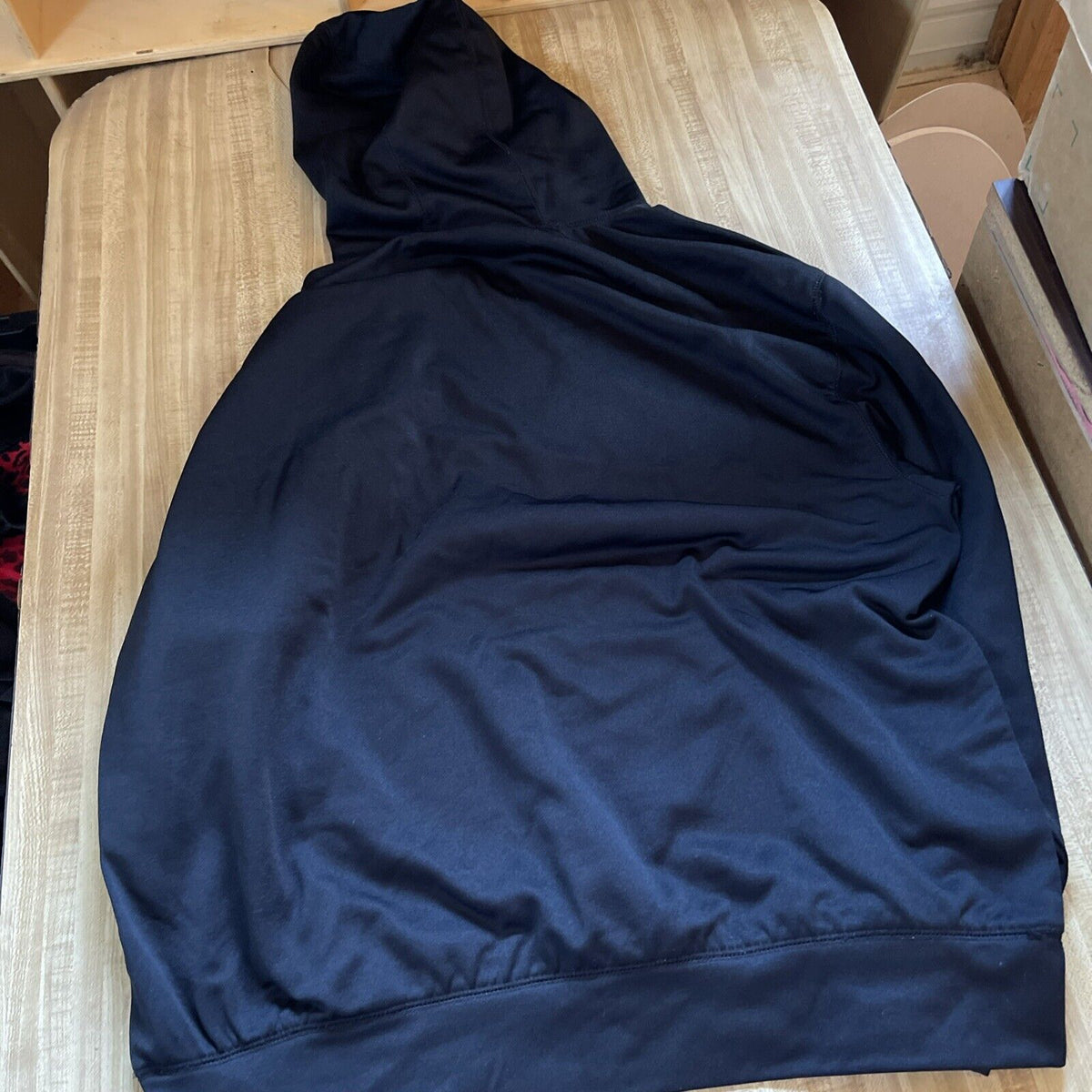 Black Kyle Busch NASCAR hoodie laid flat showing back and hood detail