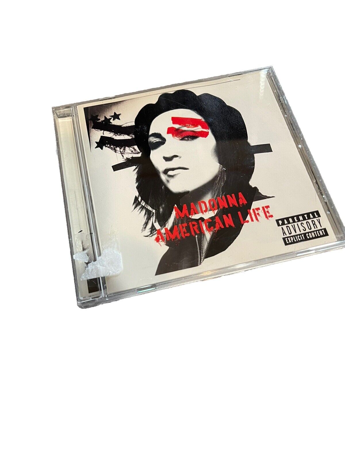 Madonna American Life CD with black and white cover art and red text in a clear jewel case