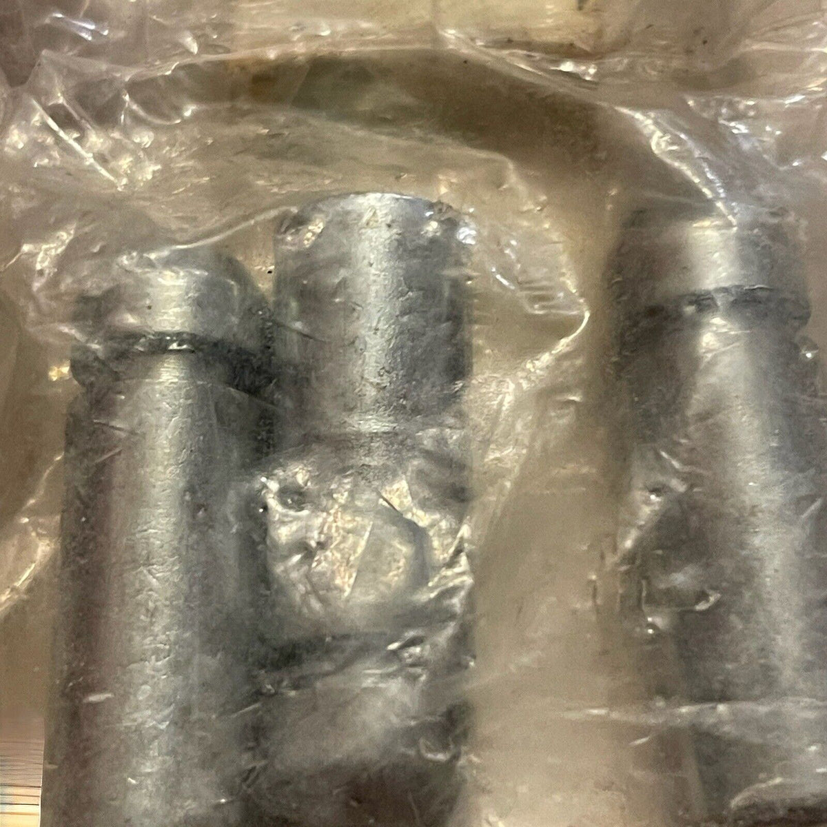 Metal dowel pin set from 1118 Emporium sealed in clear plastic packaging