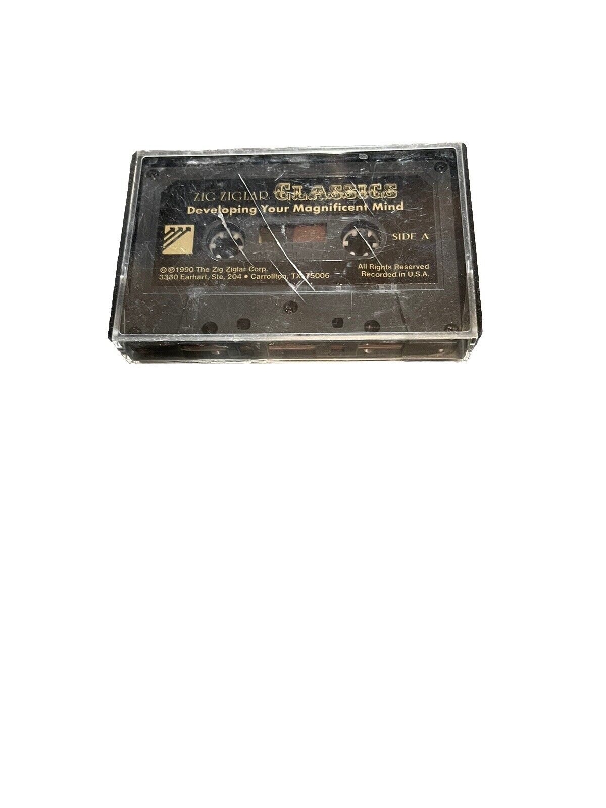 Zig Ziglar cassette tape titled Developing Your Magnificent Mind in clear plastic case